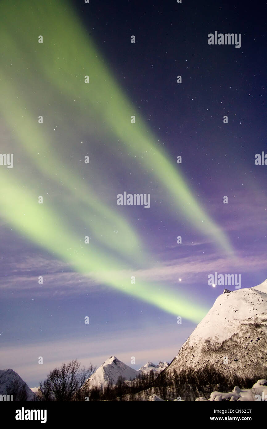 Aurora borealis or northern lights moving across night sky within the ...