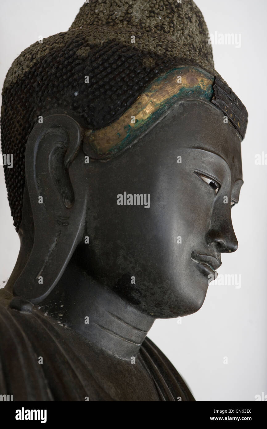 Buddha statues inside a courtyard at the Wat Benchamabophit, also known as the Marble Temple, Bangkok, Thailand Stock Photo