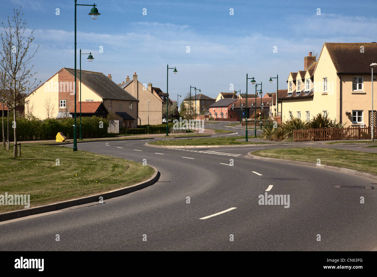 Sbend in road through Lower Cambourne Cambridgeshire England Stock