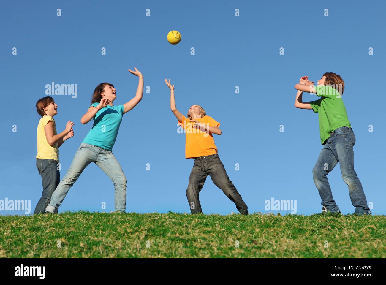 active kids playing ball at summer camp Stock Photo
