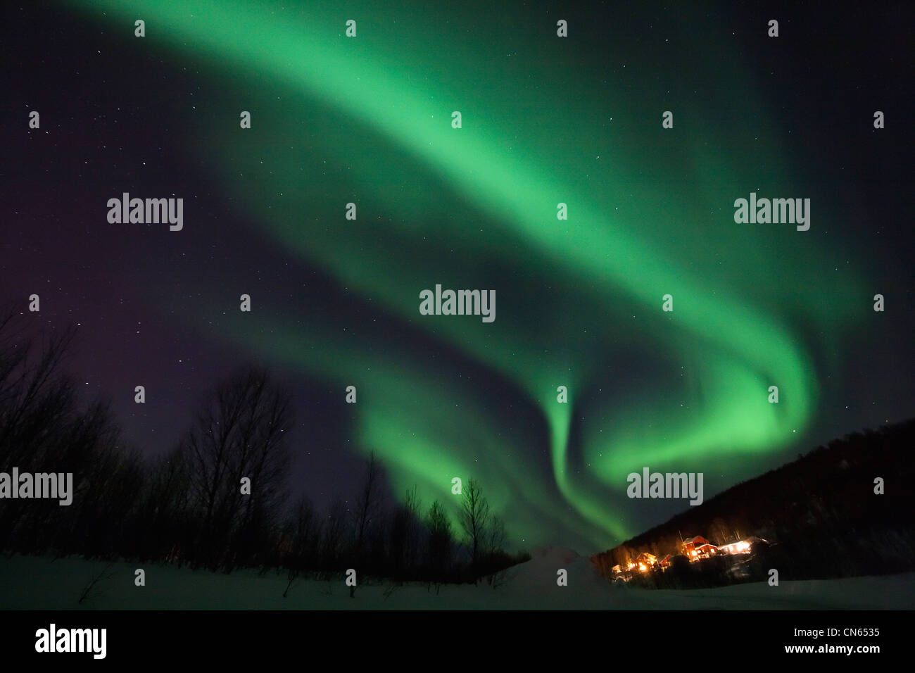 Aurora borealis or northern lights moving across night sky within the ...