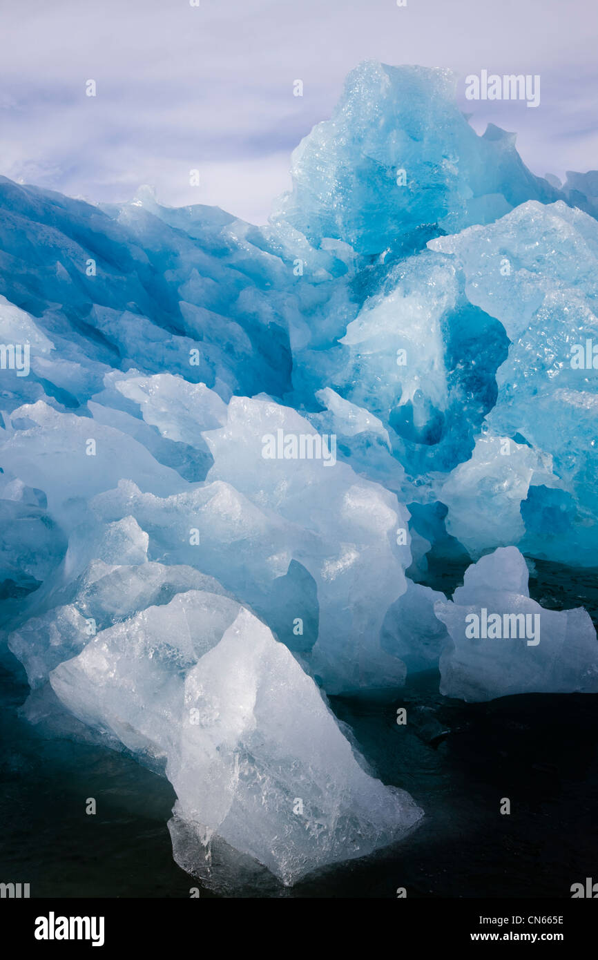 Norway, Svalbard, Spitsbergen Island, Melting iceberg floating near ...