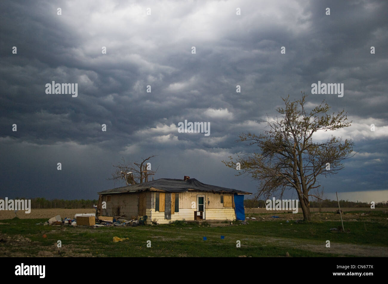 Storm Clouds Over Home Damaged By March 2 Tornado in Holton, Indiana Stock Photo