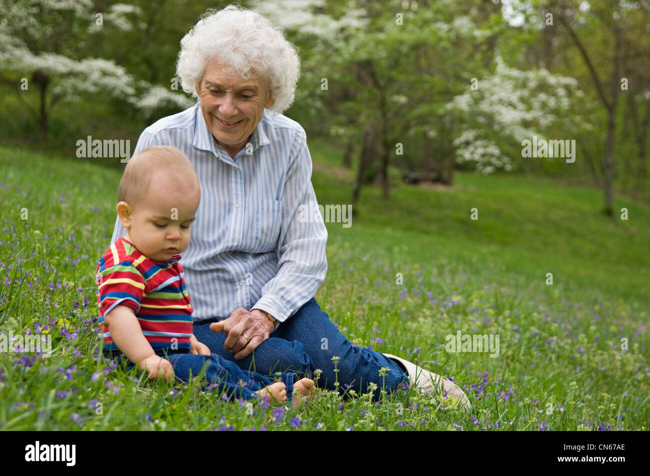 Great Grandmother and Great Grandson Outdoors on a Spring Day Stock Photo