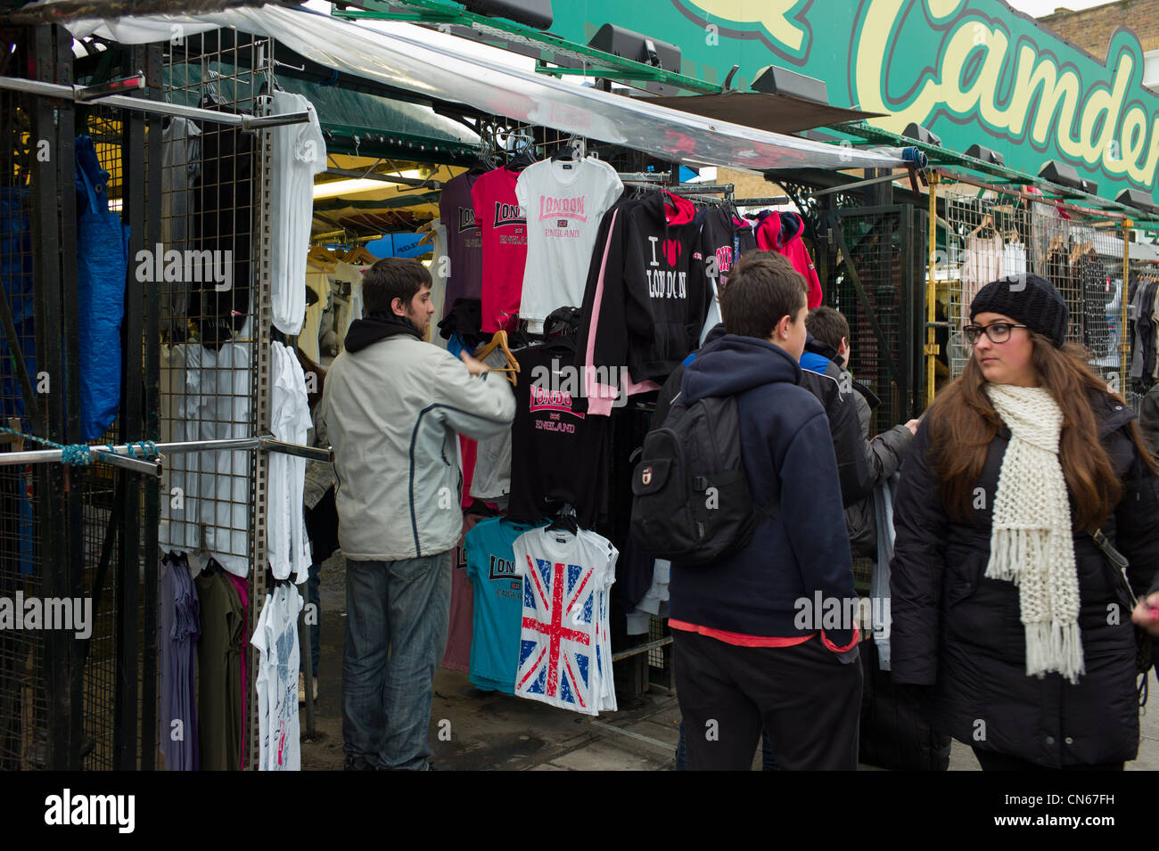 Shoppers, people buying cloths, Camden Market, Camden High Street, London England Stock Photo