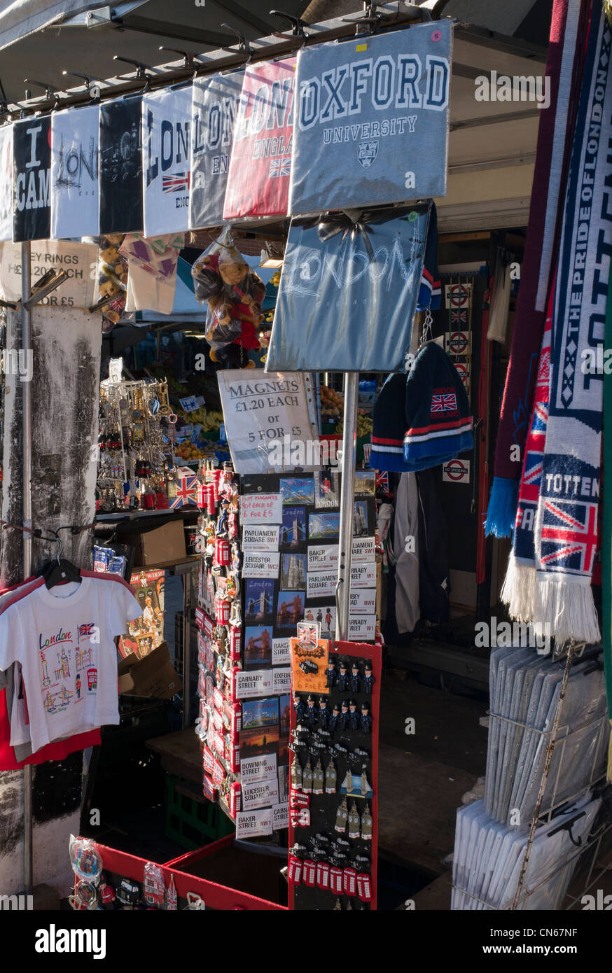 Souvenir shop selling scarves and t shirts, Camden Market, Camden Town, London Stock Photo