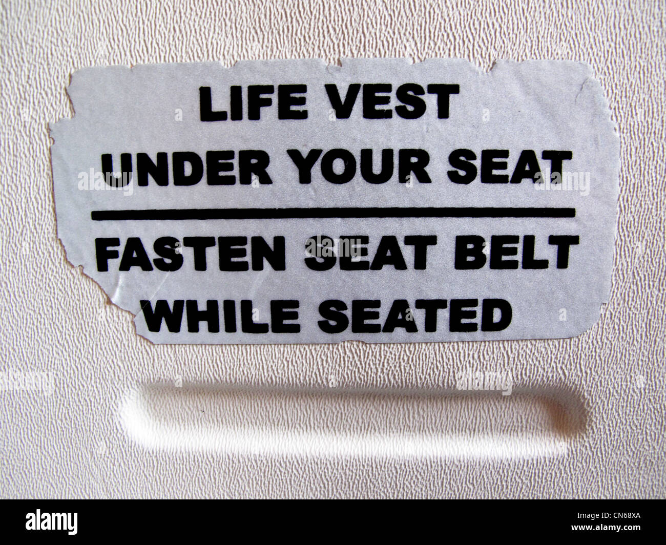 Life vest under your seat sign Stock Photo - Alamy