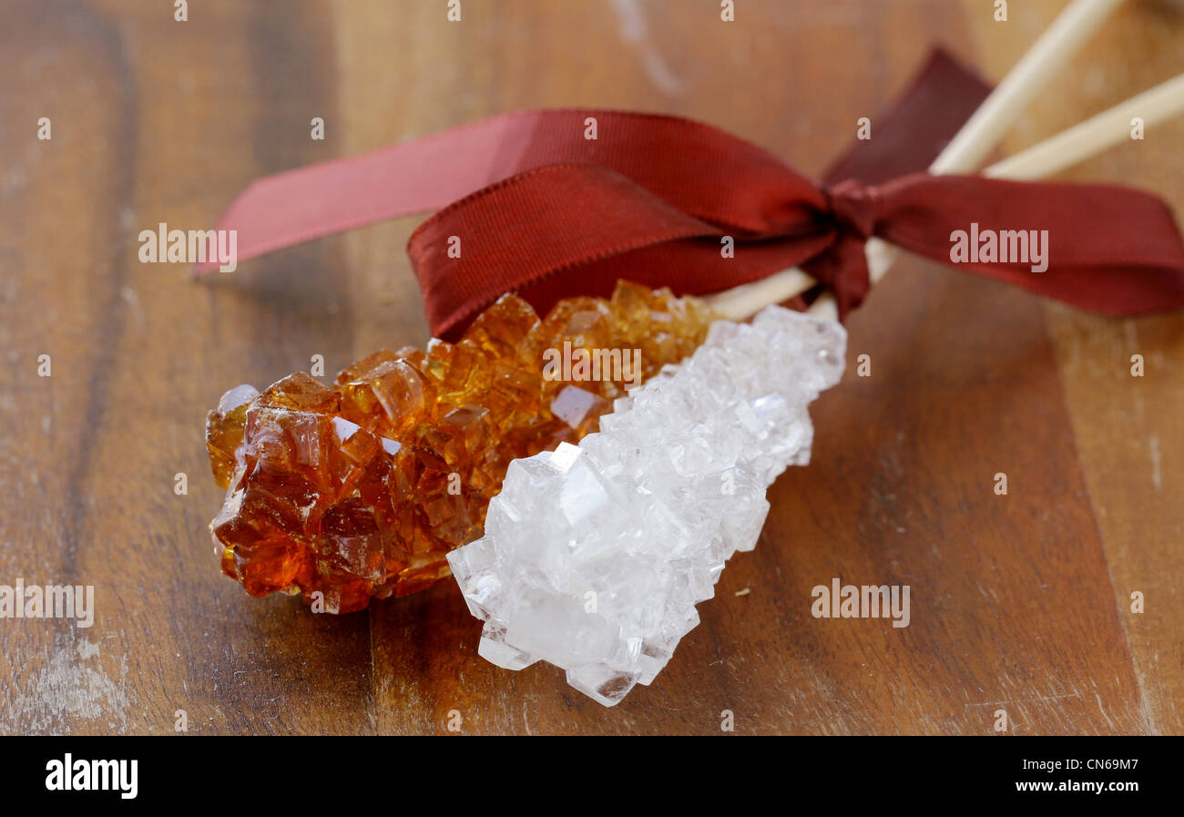 crystal sugar candy on a wooden stick Stock Photo