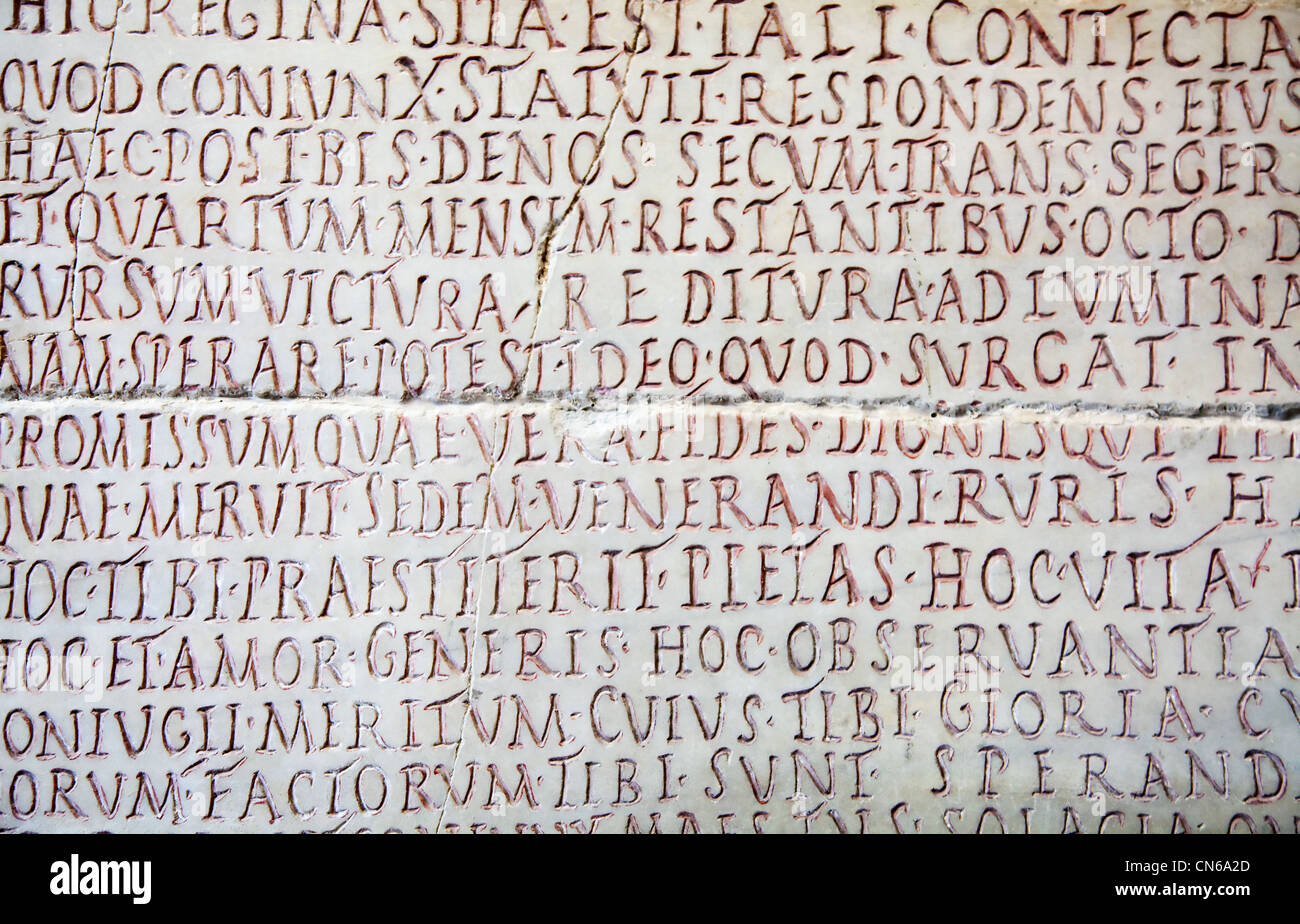 Latin writing carved on stone Stock Photo Alamy