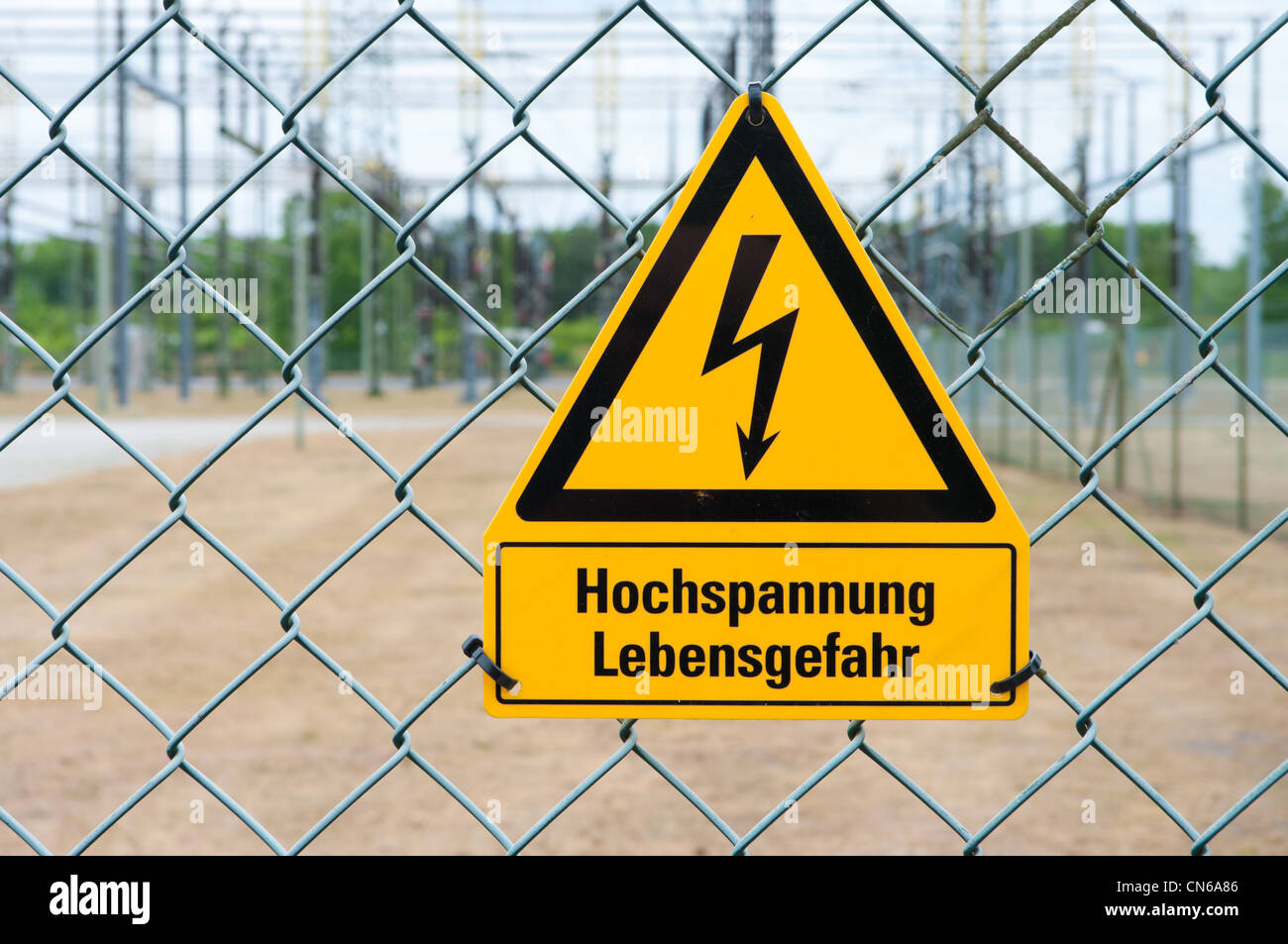 Signal of danger of death by electrocution following an electric shock - in German: Hochspannung Lebensgefahr Stock Photo