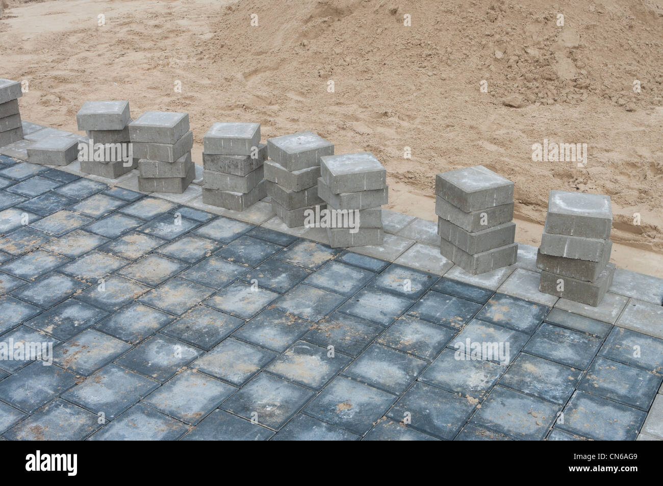 new street being paved with concrete bricks Stock Photo
