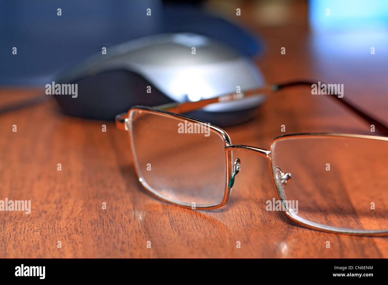 spectacles on wooden table Stock Photo