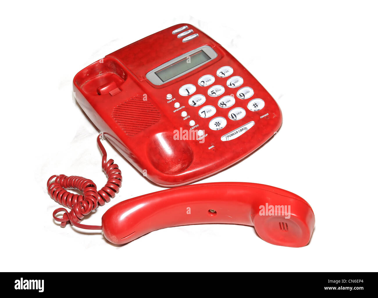 old red telephone on white background Stock Photo Alamy