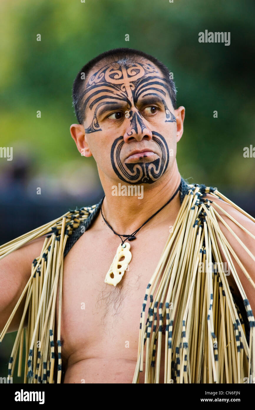 Traditional tattoos on face of Maori warrior Stock Photo