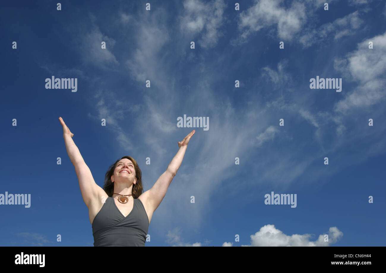 Raised arms woman hi-res stock photography and images - Alamy