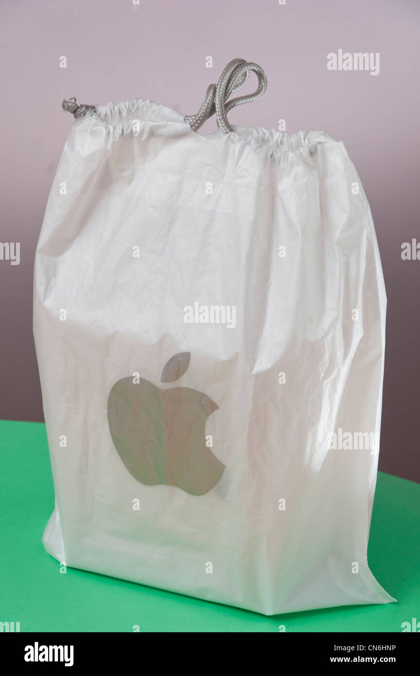 Apple logo branded carrier bag product packaging Stock Photo