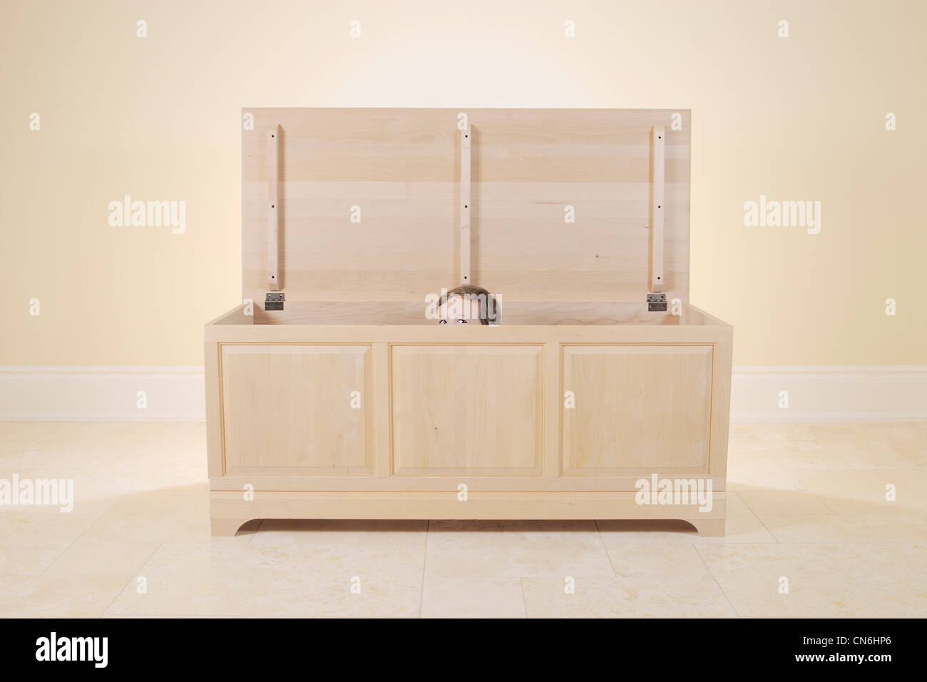 Young Boy Sitting in a Toy Box, Toronto, Ontario Stock Photo Alamy