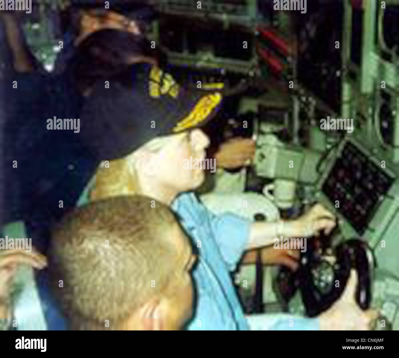 Tipper Gore at the helm of the USS Greeneville during a 'VIP' visit in 1999. Stars and Stripes, Feb 9, 2003 Stock Photo