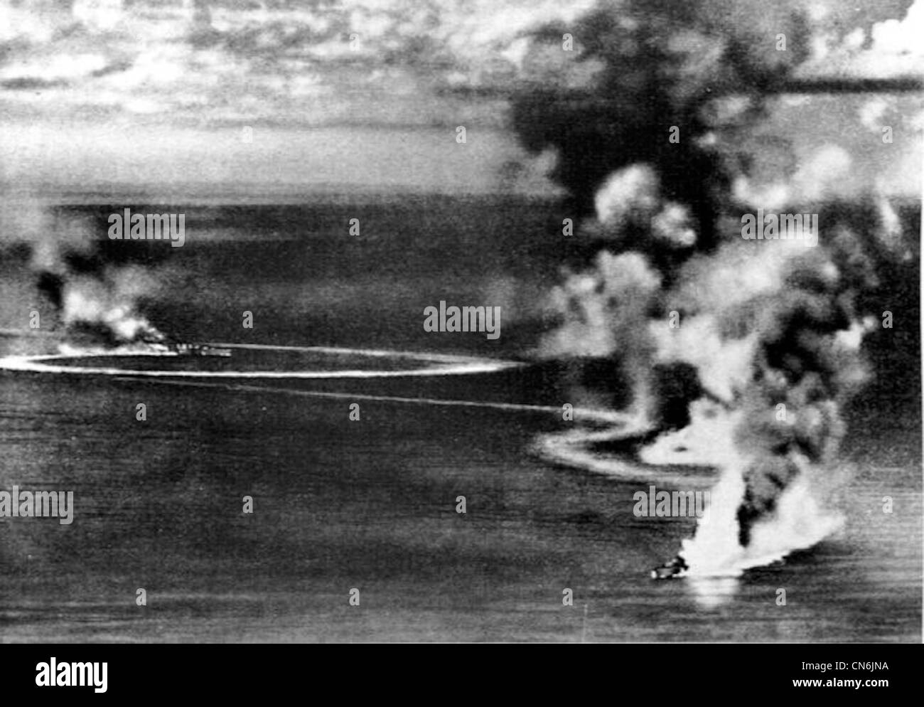 The Royal Navy heavy cruisers HMS Dorsetshire and HMS Cornwall under heavy air attack by Japanese carrier aircraft on 5 April 1942. The photo was taken from a Japanese aircraft. Stock Photo