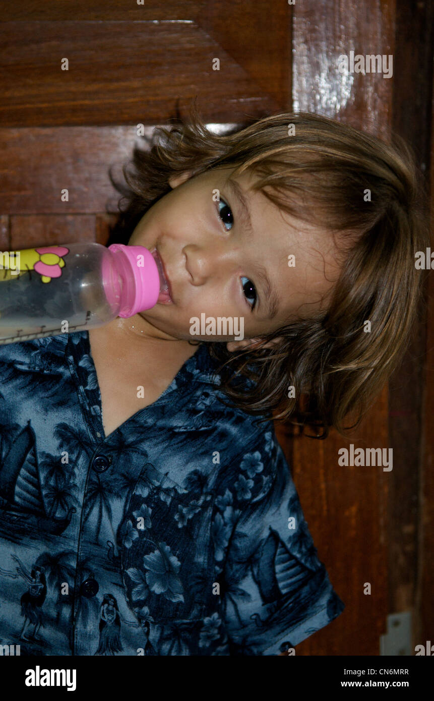 A Candid Portrait Of A 2 1 2 Year Old Mixed Race Boy Cambodian American Drinking Milk From A Baby Bottle Phnom Penh Cambodia Credit Kraig Lieb Stock Photo Alamy A Candid Portrait Of A 2 1 2 Year Old Mixed Race Boy Cambodian American Drinking Milk From A Baby Bottle Phnom Penh Cambodia Credit Kraig Lieb Stock Photo Alamy