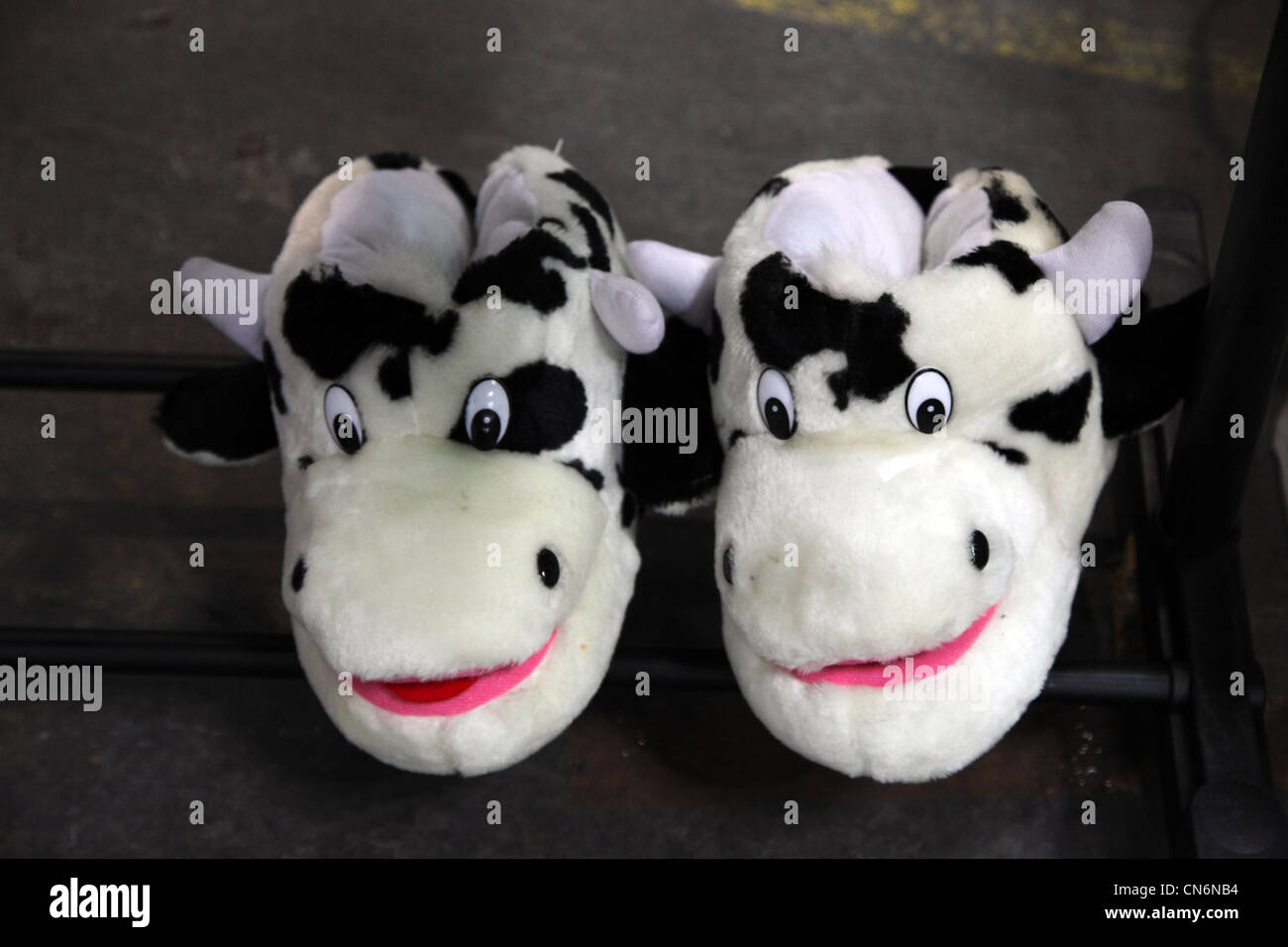 Cow slippers on sale at Merchants Yard Car Boot Sale Dublin Ireland Stock  Photo - Alamy