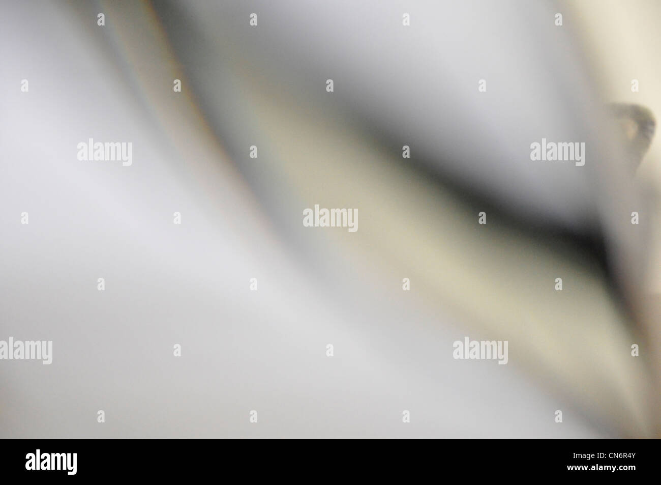 Abstract unfocused swirling white gray background Stock Photo