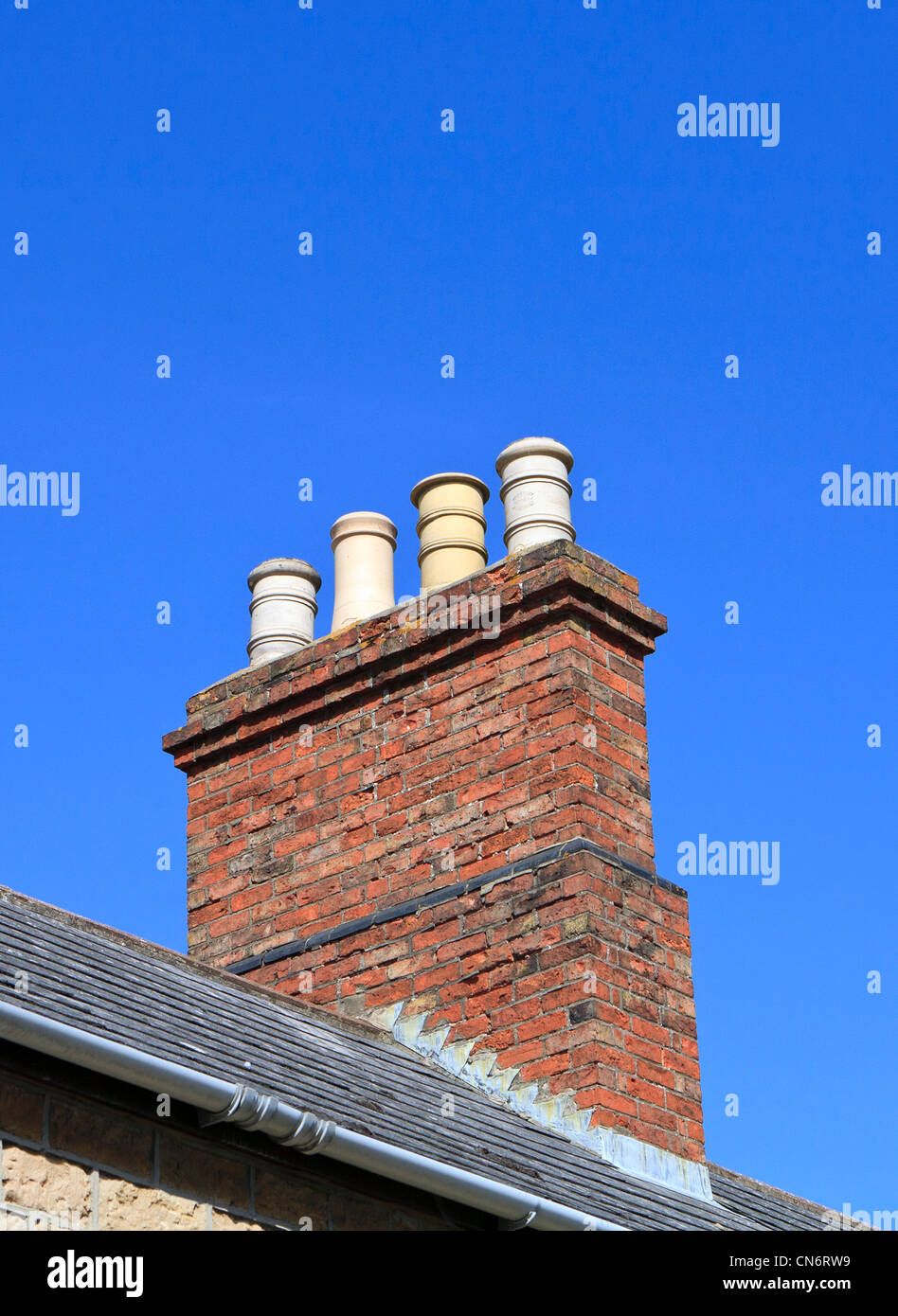 Chimney stack and chimney pots UK Stock Photo - Alamy