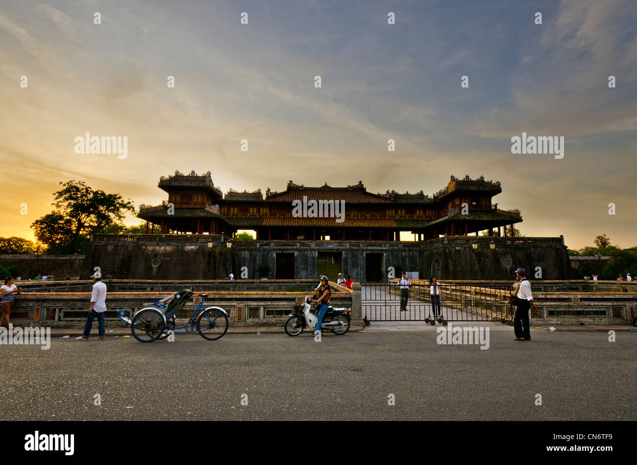 Front of Imperial City, Hue, Vietnam at Sunset with Local Traffic Stock Photo