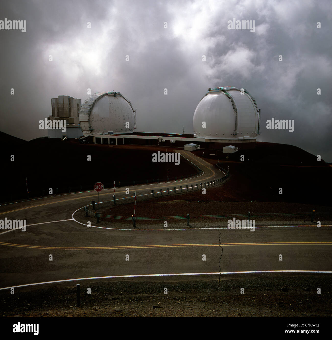 Keck Observatory and Subaru Telescope in dramatic cloud on Mauna Kea
