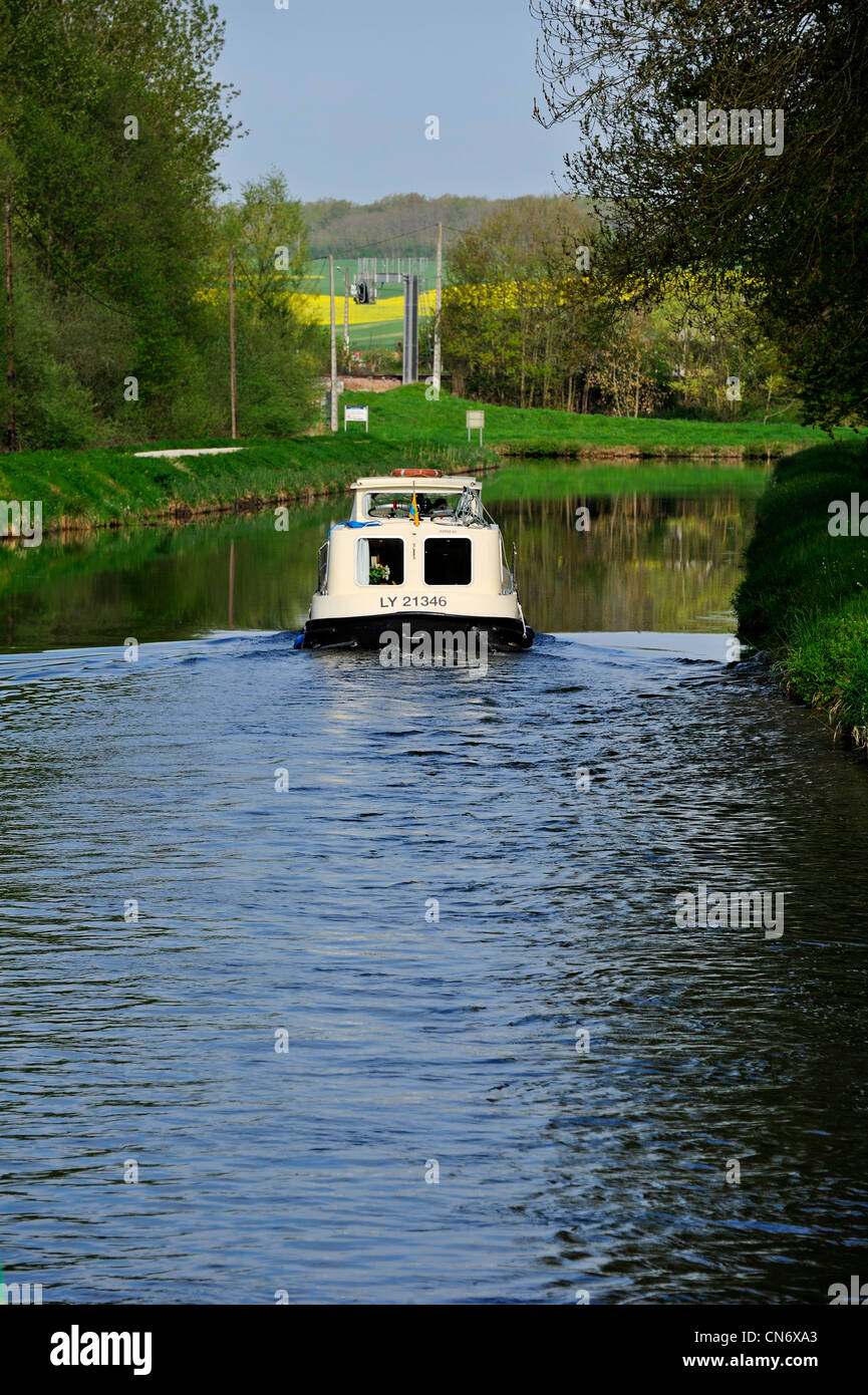 Canal barge on the Yonne River, Canal du Nivernais France. Stock Photo