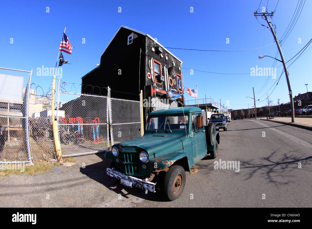 Odd house, garage and old pickup truck Red Hook Brooklyn New York City Stock Photo