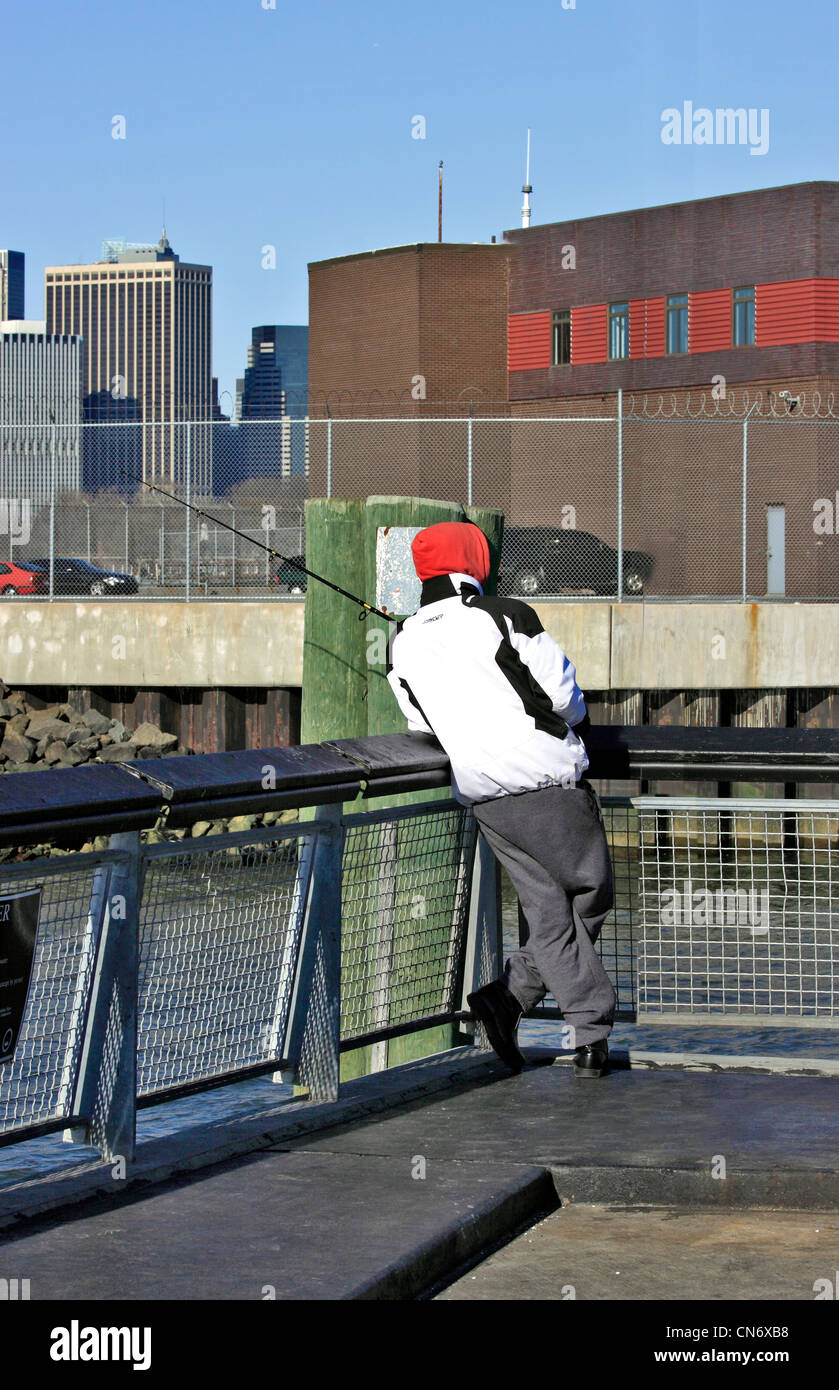 Man fishing Red Hook Brooklyn New York City Stock Photo