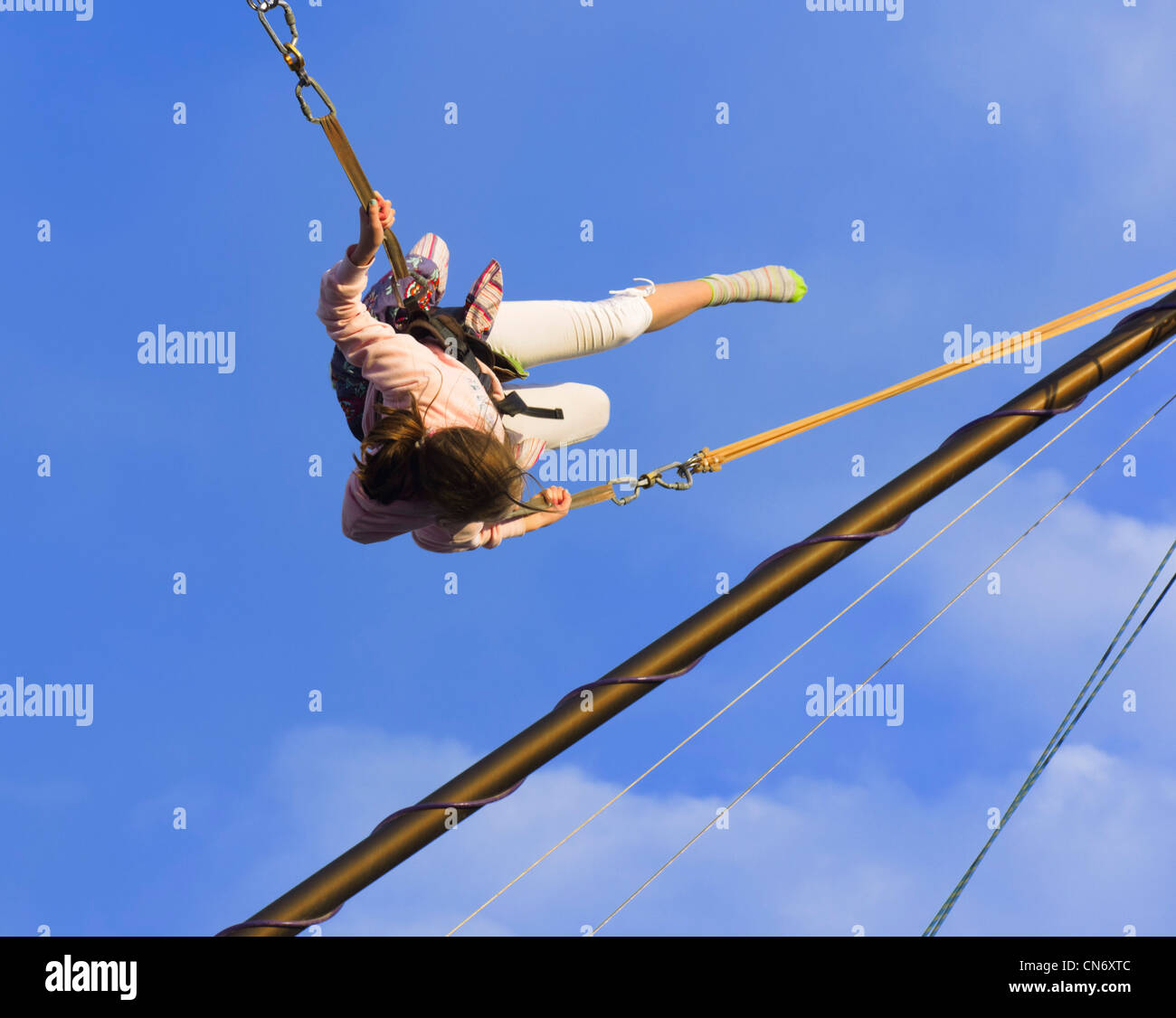 Lanzarote, Canary Islands - bungee bouncer for kids, Costa Teguise main square. Stock Photo