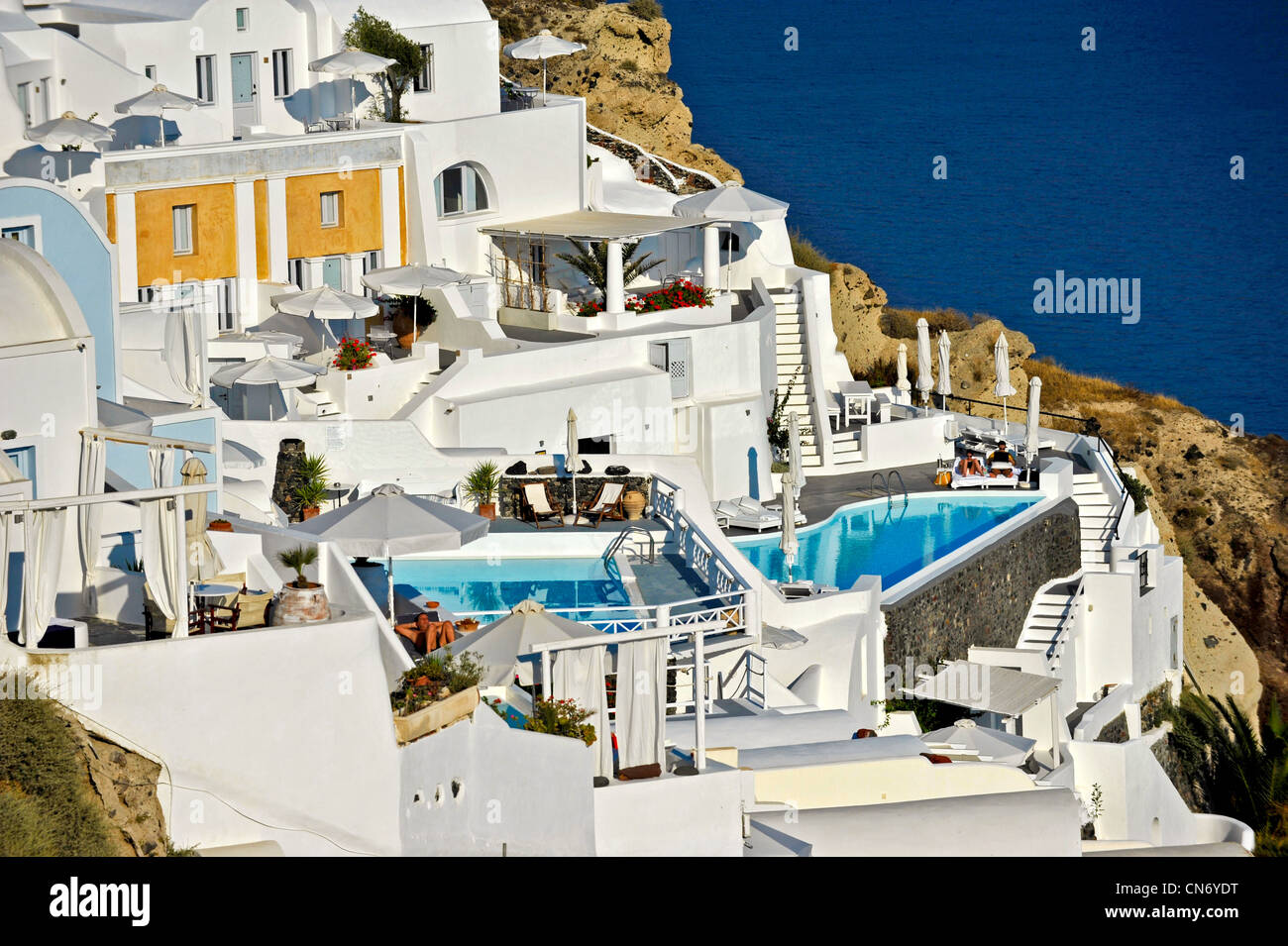 Greece Cyclades Islands Santorini in the village of Oia  terrace overlooking the sea with  Swimming Pool Stock Photo
