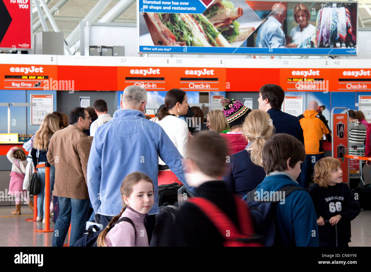 Crowded Easyjet baggage checkin queue, Stansted airport Essex UK Stock