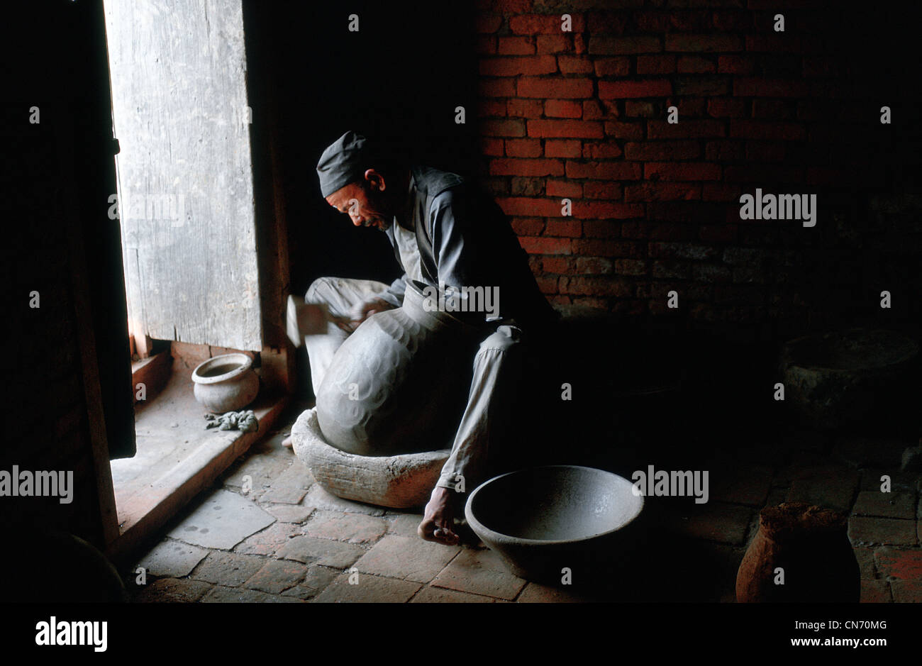Potter at work ( Nepal) Stock Photo
