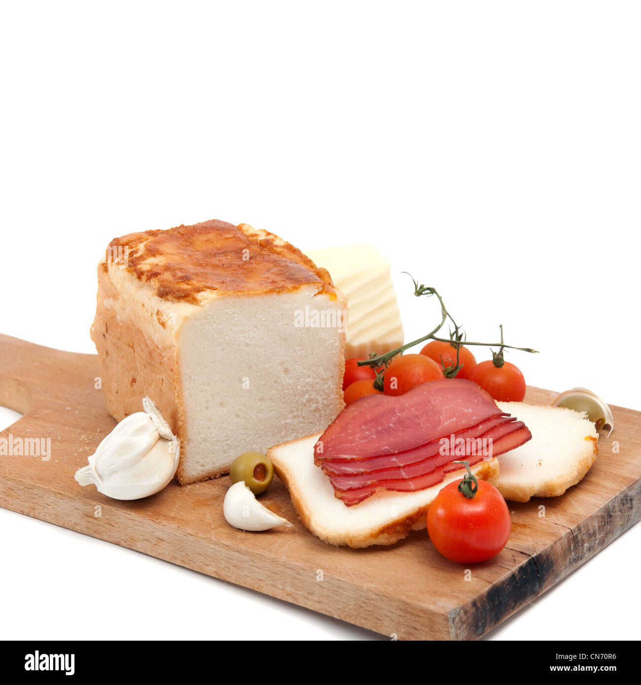 Gluten free bread with olive, red cherry tomato, garlic, cheese and