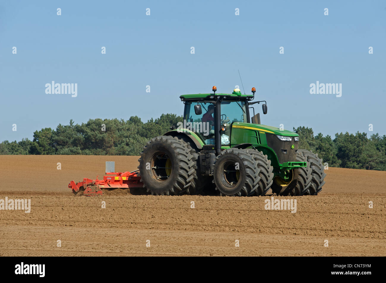 Tractor cultivating field Bawdsey Suffolk UK Stock Photo - Alamy