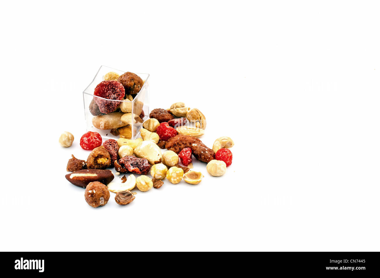 Mixed dried fruit sample on white background Stock Photo