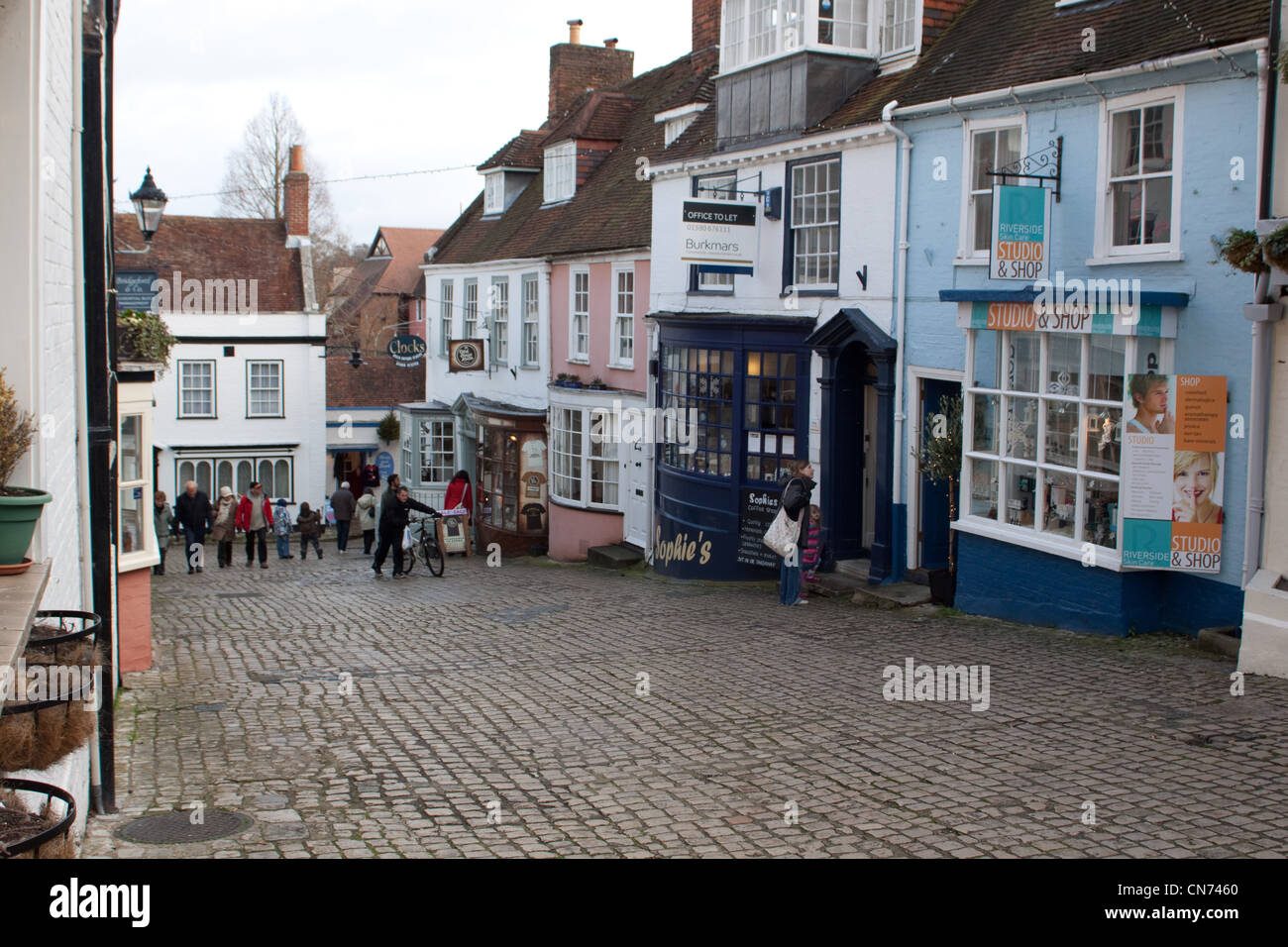 The cobbled street of Quay Hill in Lymington, Hampshire Stock Photo