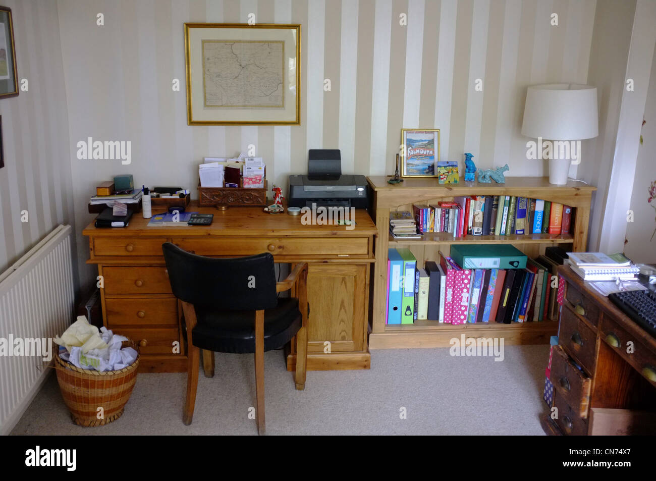 A tidy pensioners office at home Stock Photo