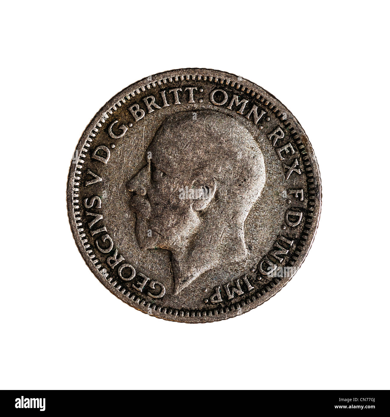 An English pre decimal sixpence coin dated 1928 on a white background Stock Photo