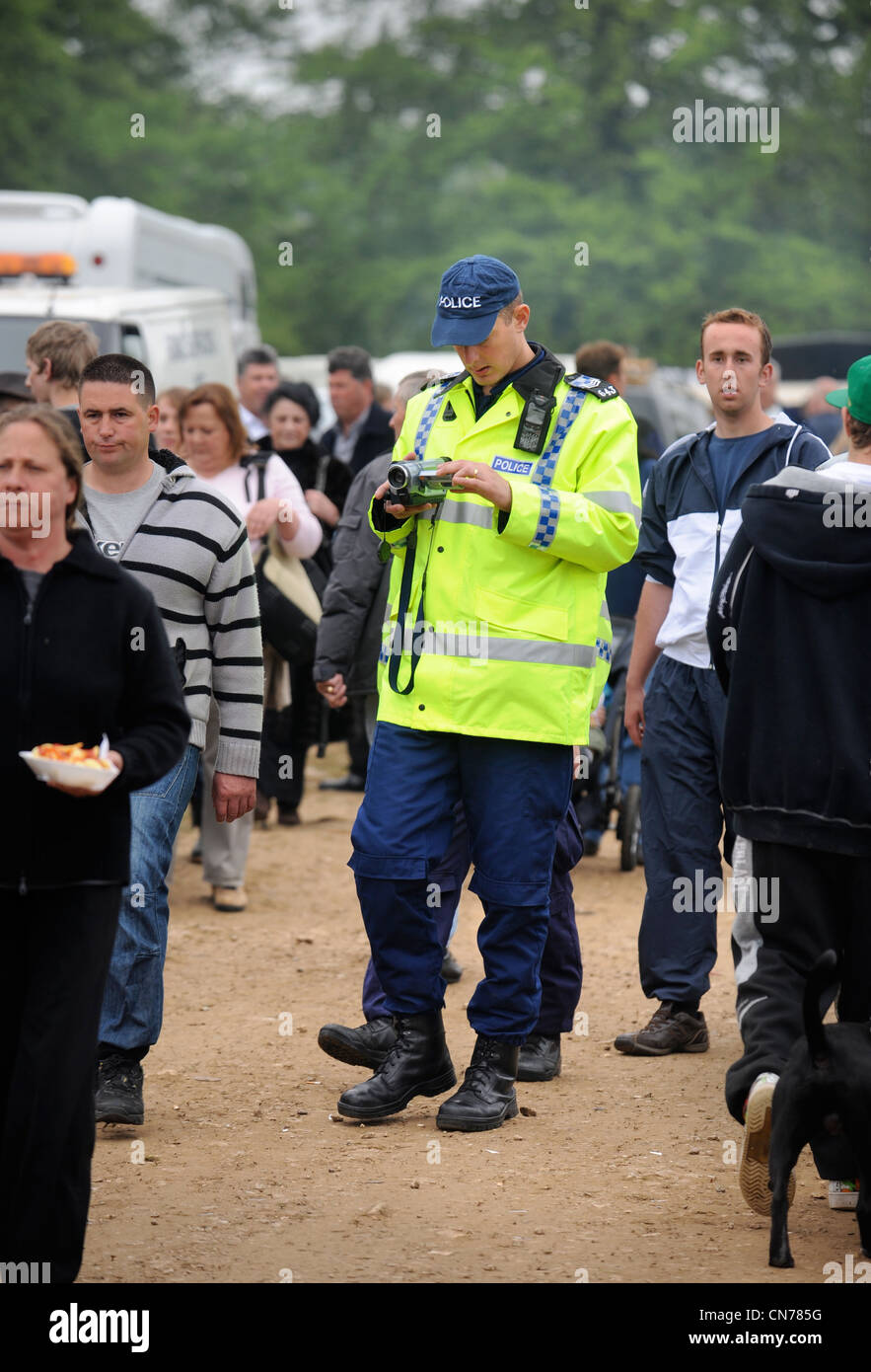 A policeman at the StowontheWold horse fair using overt video