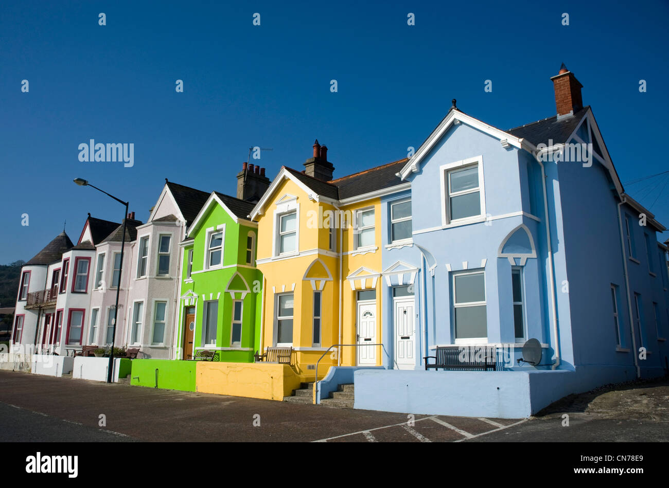 Colourful houses on the seafront at Whitehead Stock Photo Alamy