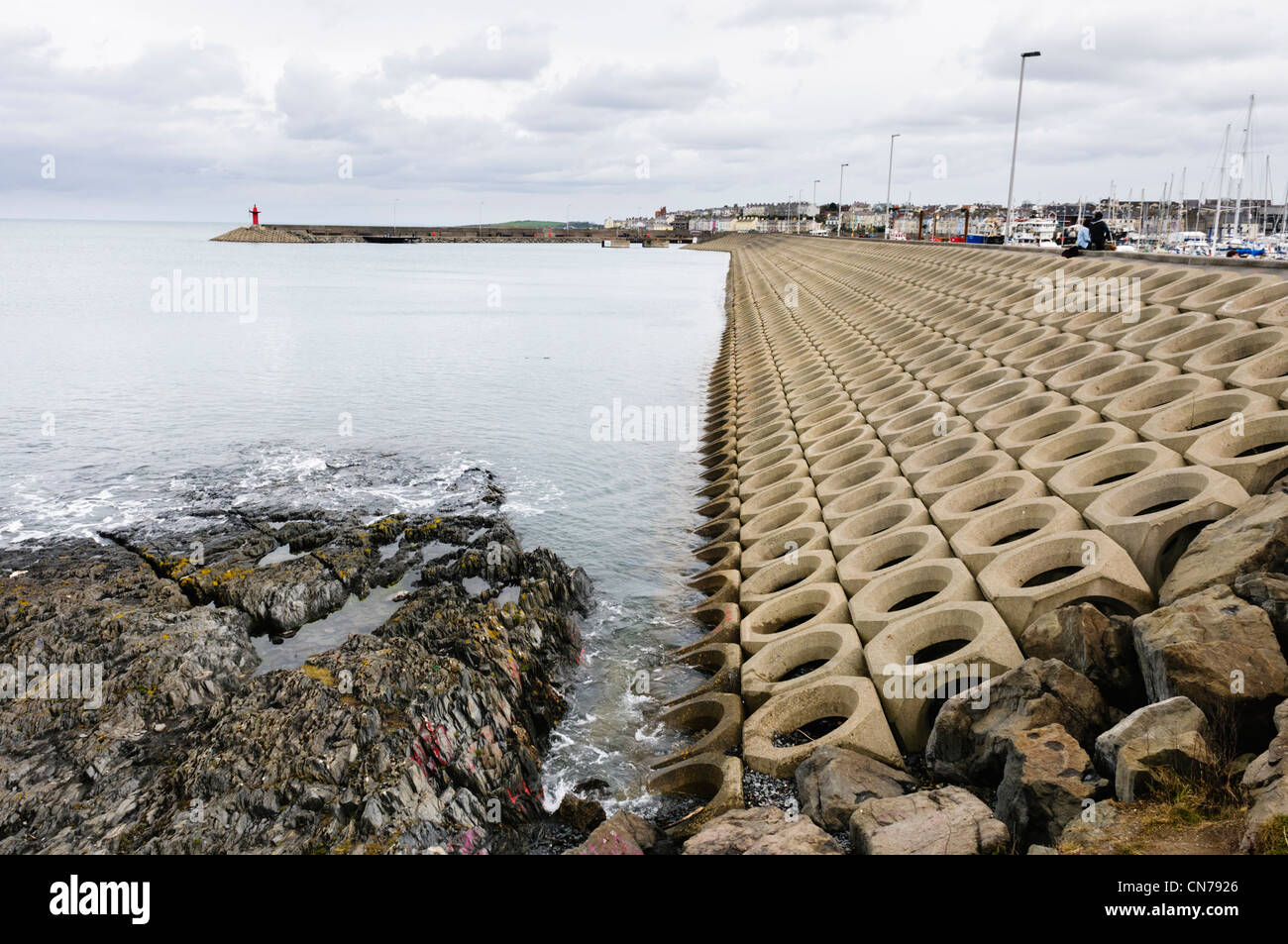 Pre-cast concrete revetement sea defences at Bangor harbour Stock Photo