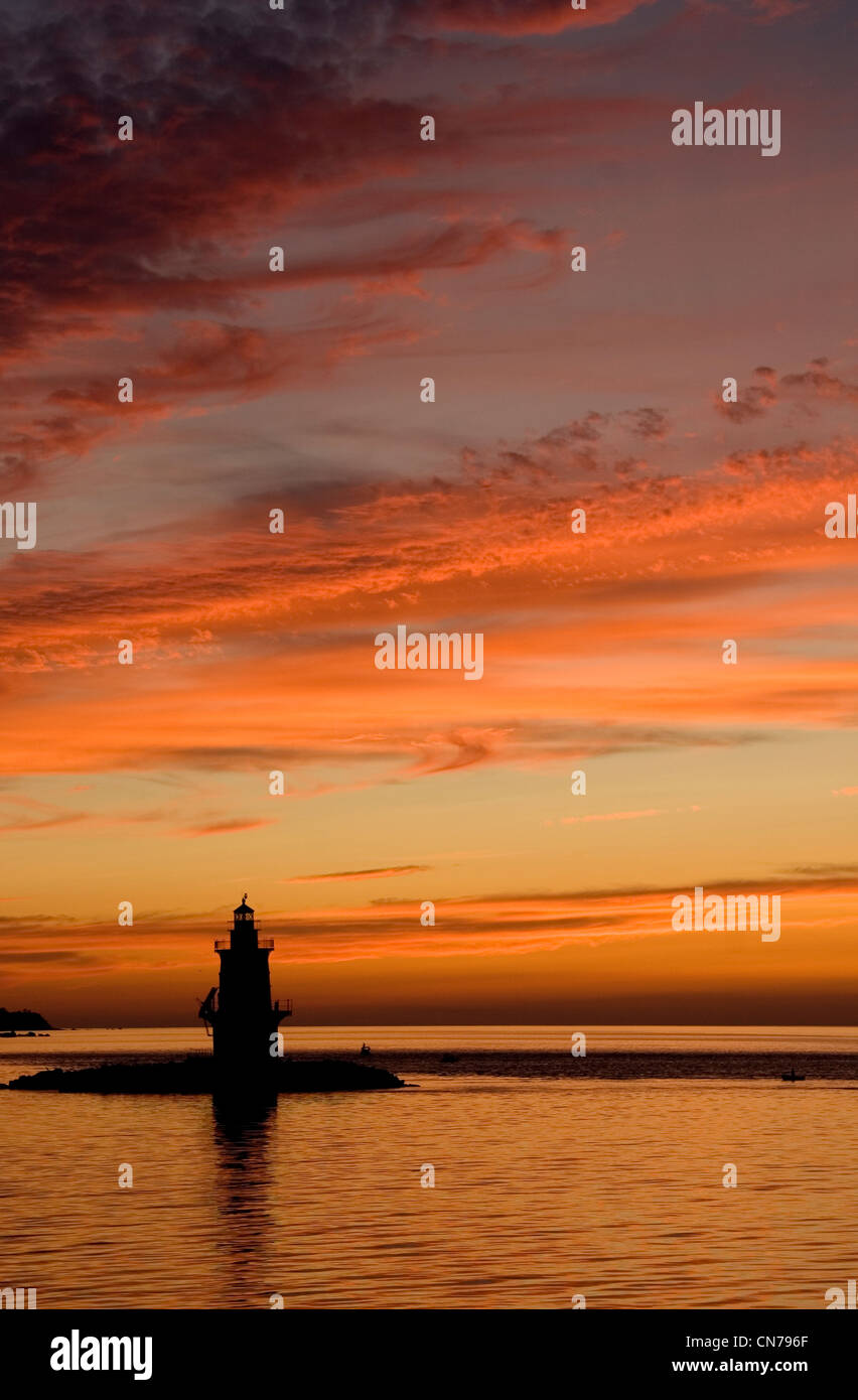 Lighthouse at Orient Point in the evening sunset, Long Island Sound, New York State, United States of America Stock Photo