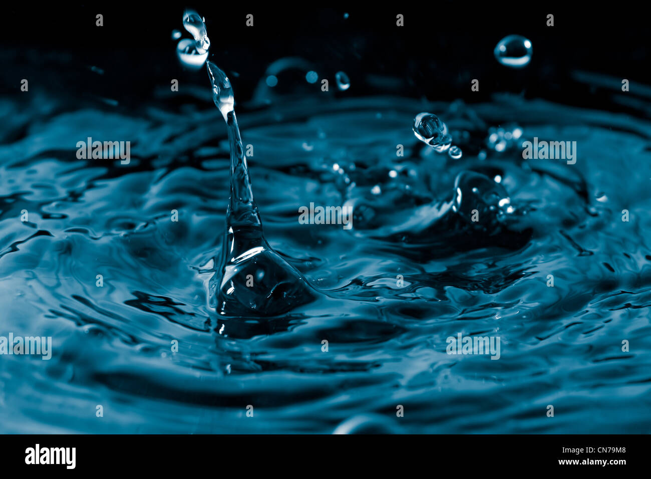 A water droplets background texture and splash. Shallow depth of field ...