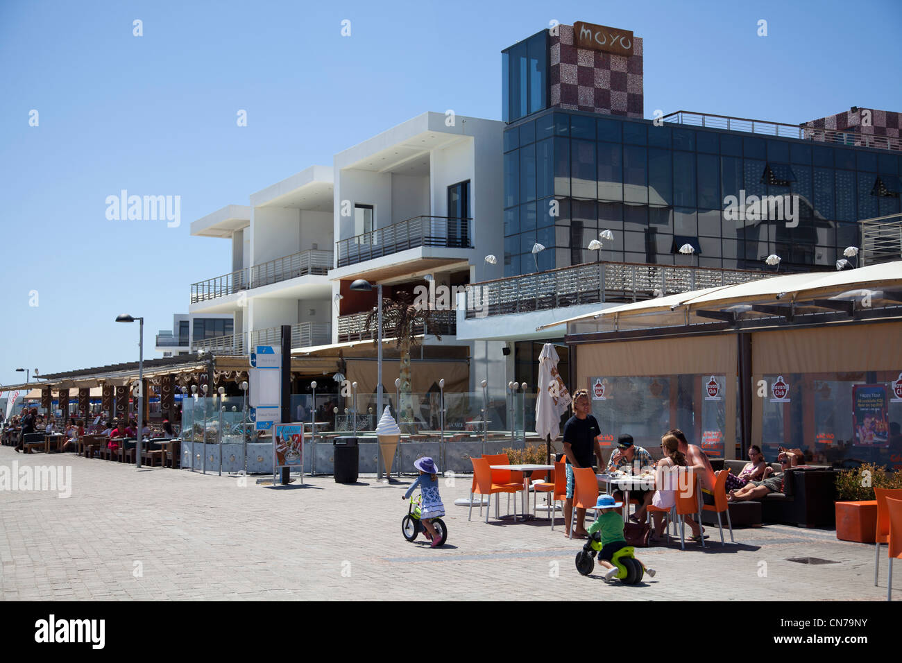 Promenade of Restaurants in Big Bay - Bloubergstrand - Cape Town Stock Photo