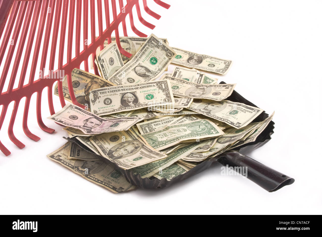 Raking in American Money Stock Photo Alamy