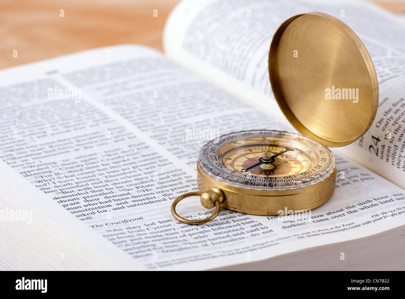Compass on a Bible Stock Photo Alamy